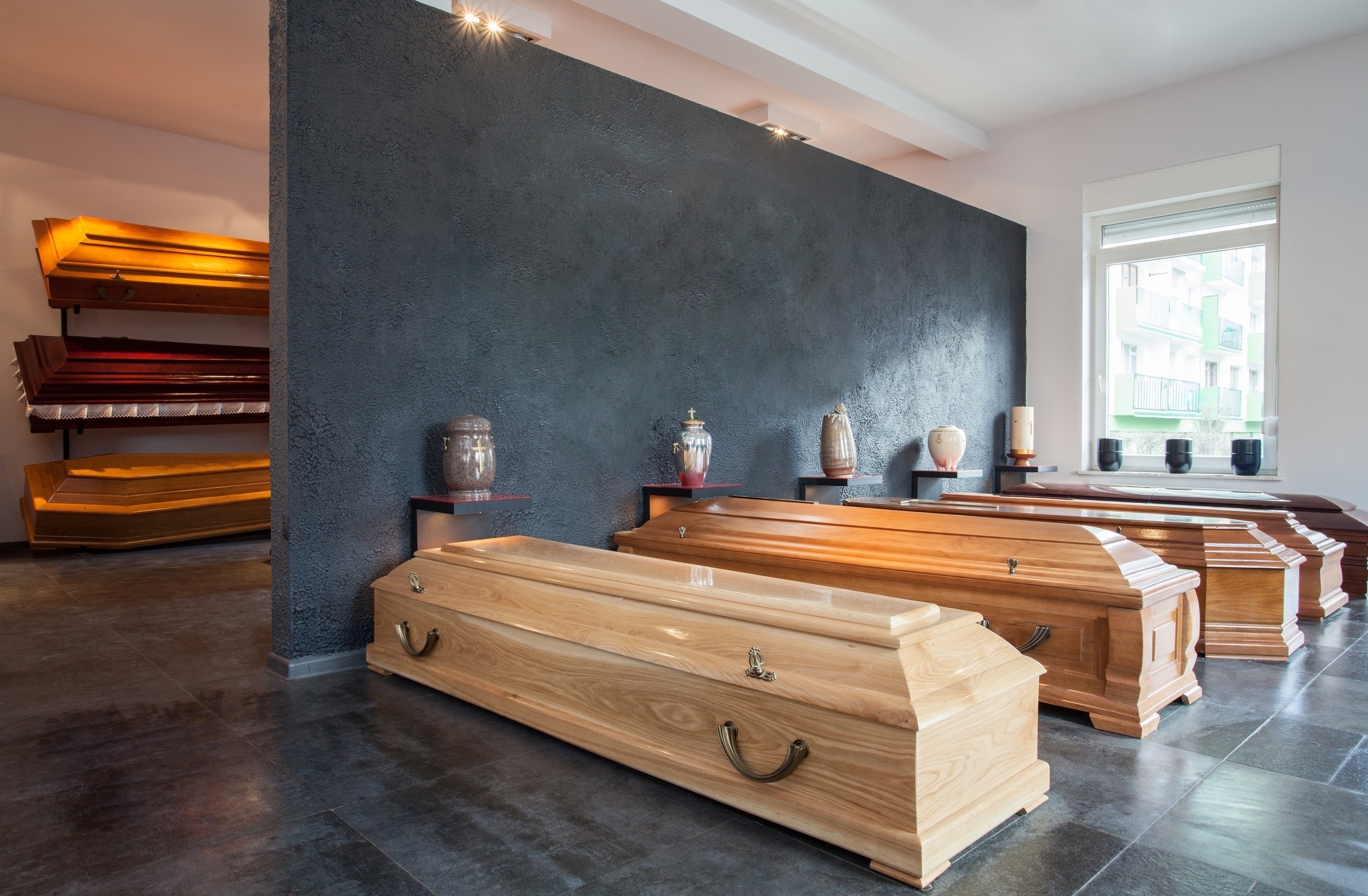 Urns for ashes and coffins. Keeping urns in a cemetery article by Pulvis Art Urns